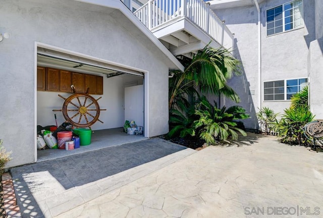 view of patio featuring a balcony