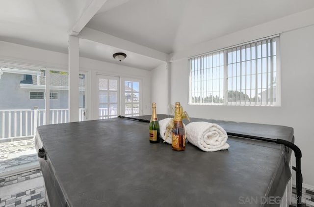 dining area featuring vaulted ceiling