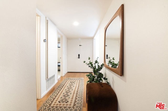 hallway featuring light wood-type flooring