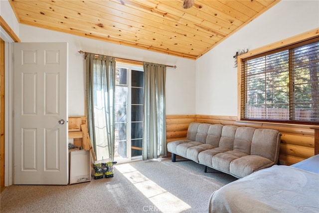 carpeted living room featuring vaulted ceiling and wooden ceiling