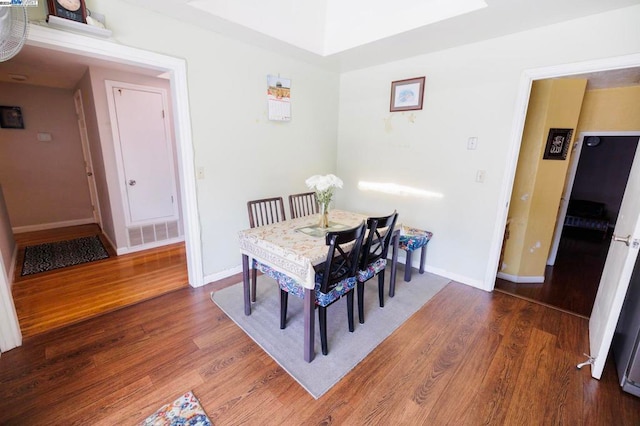 dining area featuring hardwood / wood-style floors