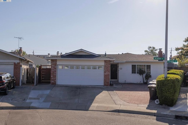 single story home with a garage