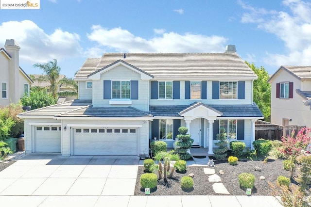 view of front of property with a garage