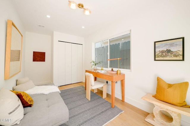 home office with light wood-type flooring