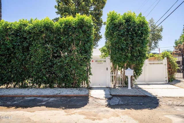 view of property hidden behind natural elements