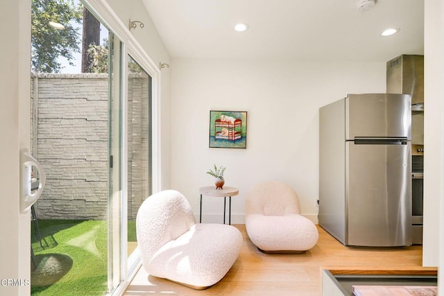 living area featuring hardwood / wood-style flooring