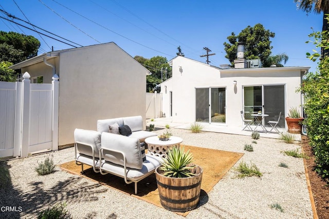 back of house with a patio area