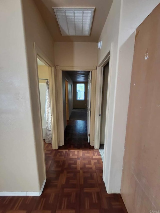 hall featuring dark parquet floors