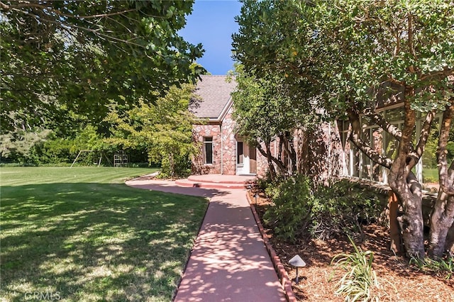 view of front of property with a front lawn