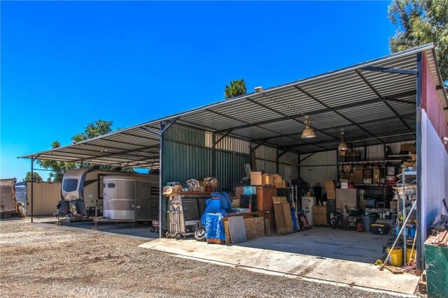 exterior space with a carport