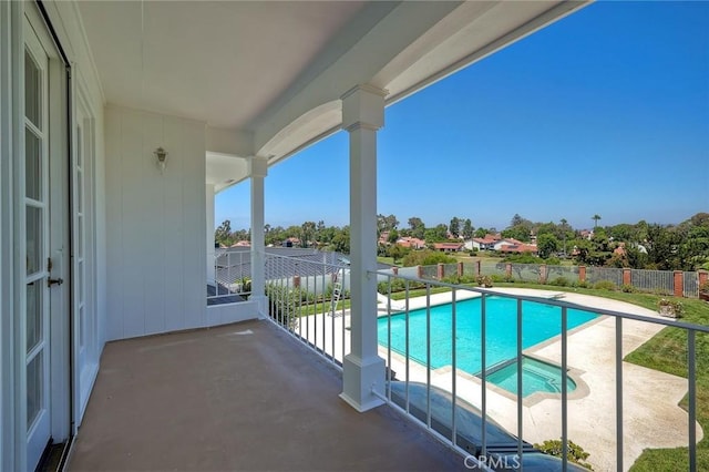 view of pool featuring an in ground hot tub, a fenced backyard, a fenced in pool, and a patio