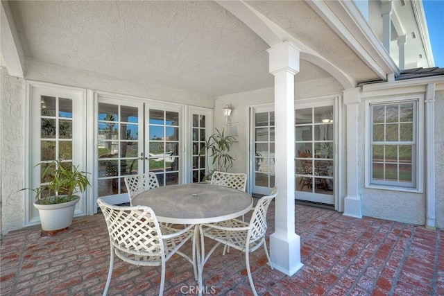 sunroom / solarium with ornate columns