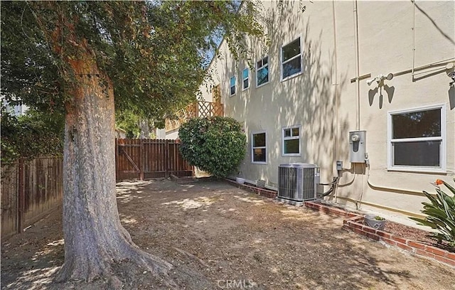 view of home's exterior with central AC unit