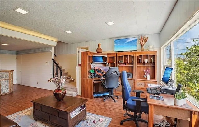 office with hardwood / wood-style flooring