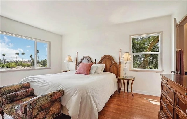 bedroom with light wood-type flooring