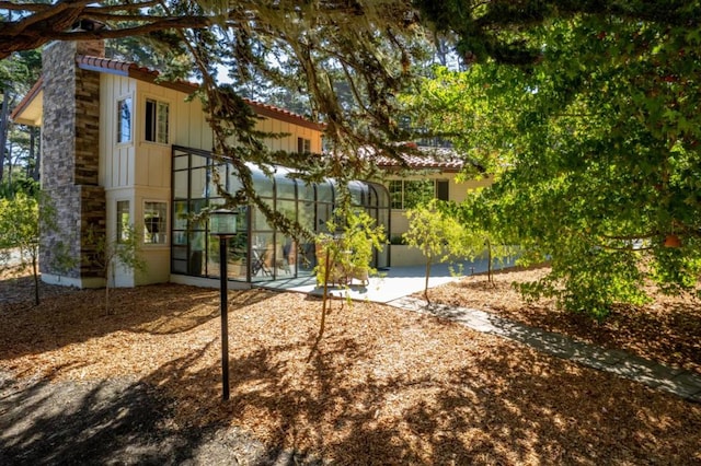 surrounding community featuring a patio area