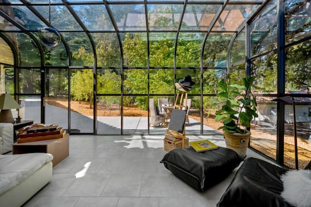 sunroom featuring a wealth of natural light