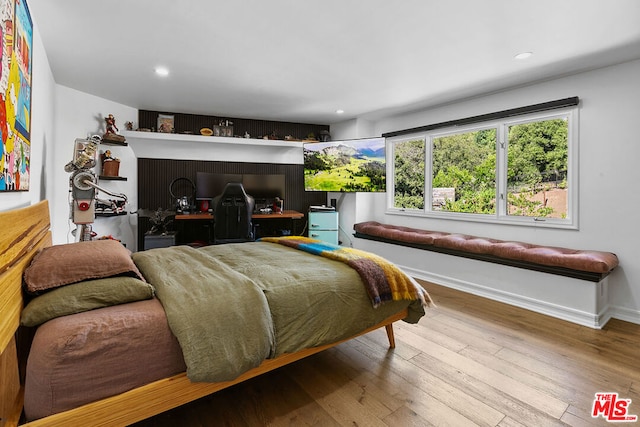 bedroom featuring light hardwood / wood-style floors