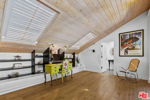 sitting room featuring wood-type flooring, wood ceiling, and lofted ceiling with skylight