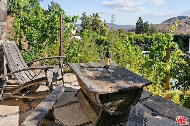 view of patio featuring a mountain view