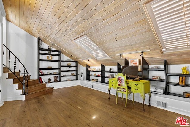 office with hardwood / wood-style flooring, lofted ceiling with skylight, and wooden ceiling