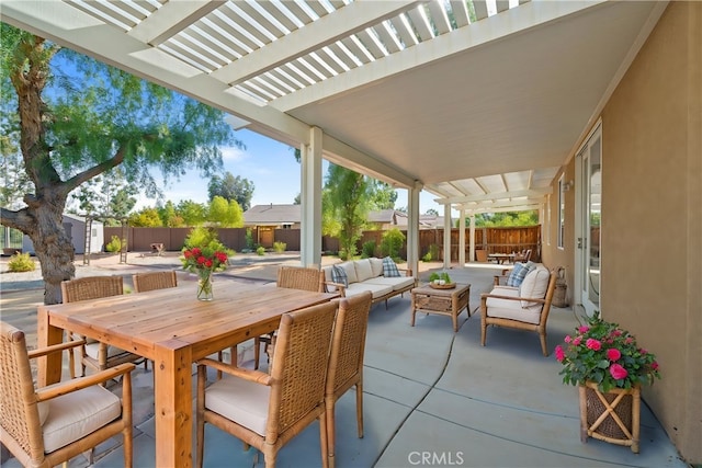 view of patio / terrace with a pergola and an outdoor living space