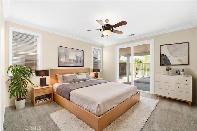 carpeted bedroom with ornamental molding, ceiling fan, and access to exterior