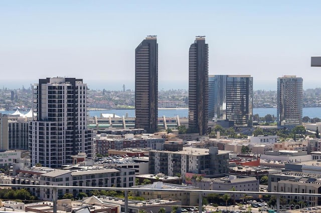 property's view of city featuring a water view