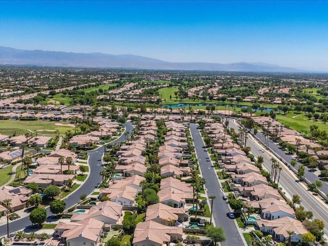 drone / aerial view featuring a mountain view