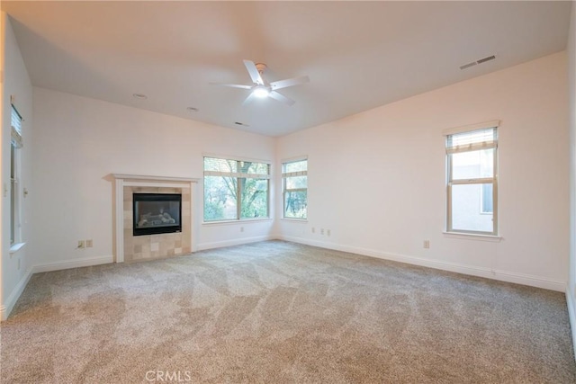 10 Hidden Brooke Way, Chico, CA 95928 - unfurnished living room featuring a ceiling fan, healthy amount of natural light, carpet, and a fireplace