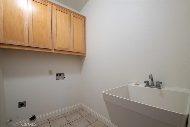 10 Hidden Brooke Way, Chico, CA 95928 - laundry area featuring cabinet space, electric dryer hookup, and light tile patterned flooring