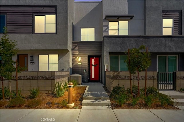 view of front of home featuring central AC unit