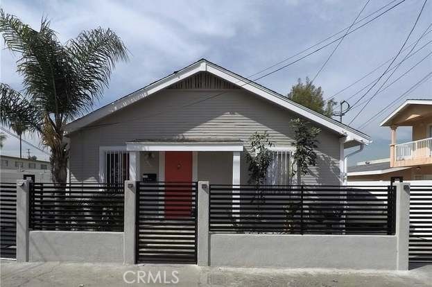 view of front of home with a balcony