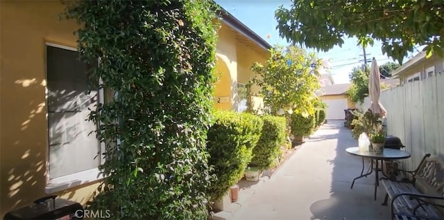 view of property exterior featuring a patio