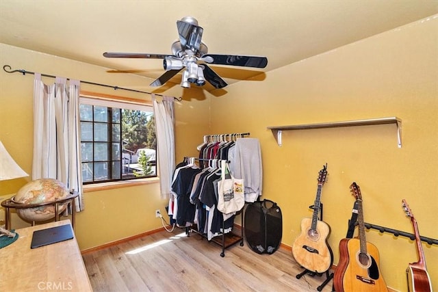 bedroom featuring ceiling fan and light hardwood / wood-style floors