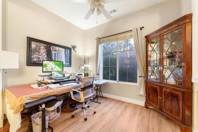 office area with light hardwood / wood-style floors and ceiling fan