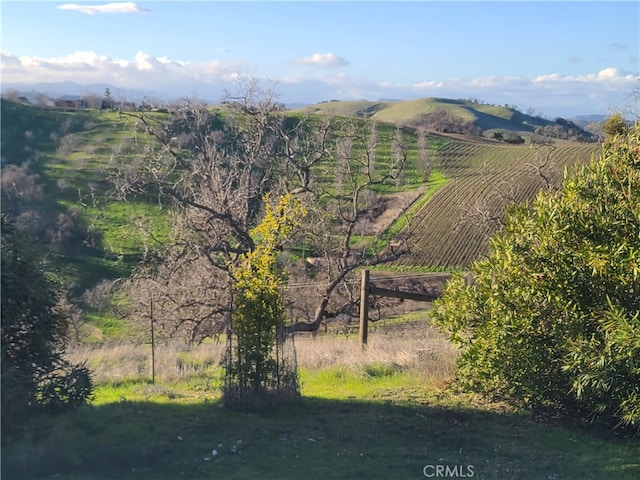 view of mountain feature with a rural view