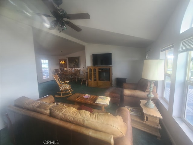 carpeted living room featuring ceiling fan and lofted ceiling