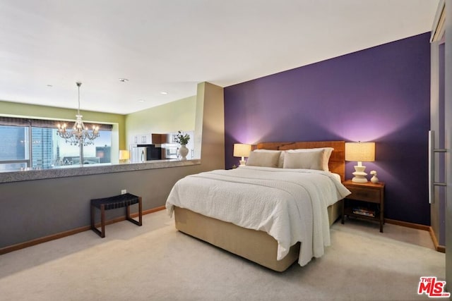 bedroom featuring stainless steel fridge, a chandelier, and carpet flooring