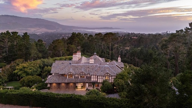 aerial view at dusk with a mountain view