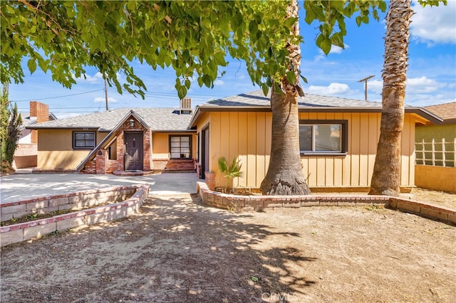 view of front of property with a patio area