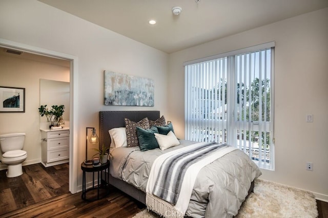 bedroom featuring hardwood / wood-style floors