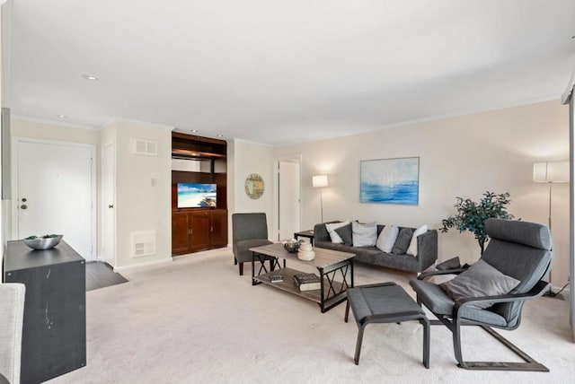 living room featuring light colored carpet and ornamental molding