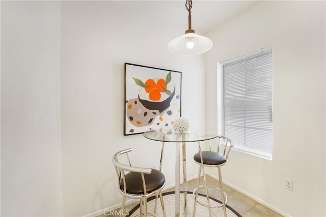 view of tiled dining space