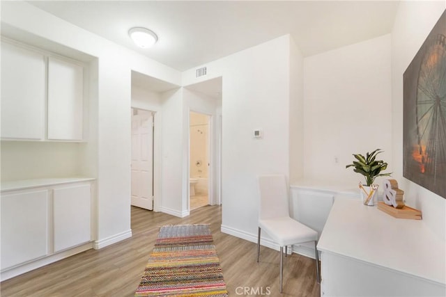 interior space with light hardwood / wood-style floors