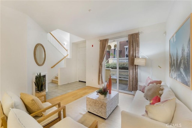 living room with light hardwood / wood-style floors