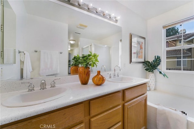 bathroom with vanity and plus walk in shower