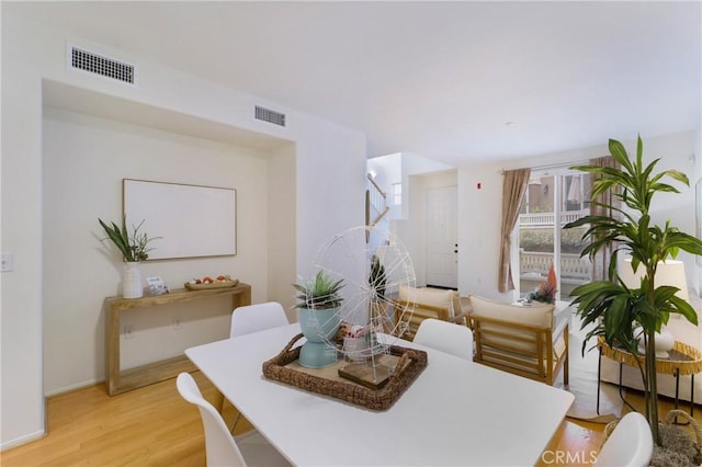 dining room featuring light wood-type flooring