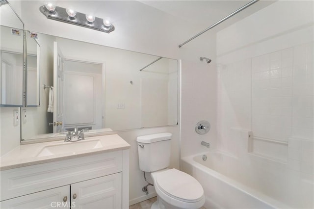 full bathroom with toilet, vanity, and  shower combination