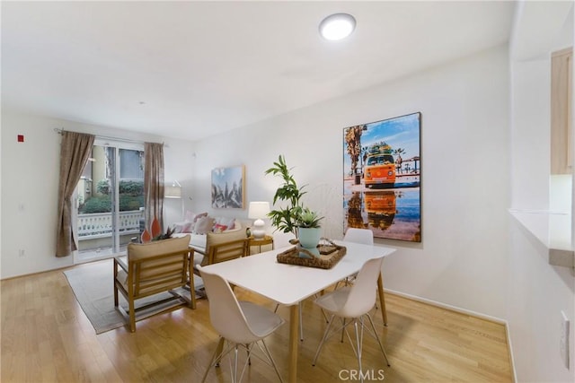 dining area featuring light hardwood / wood-style floors